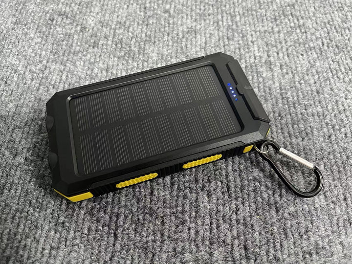 Portable solar power bank with integrated charging plug function Stornfield