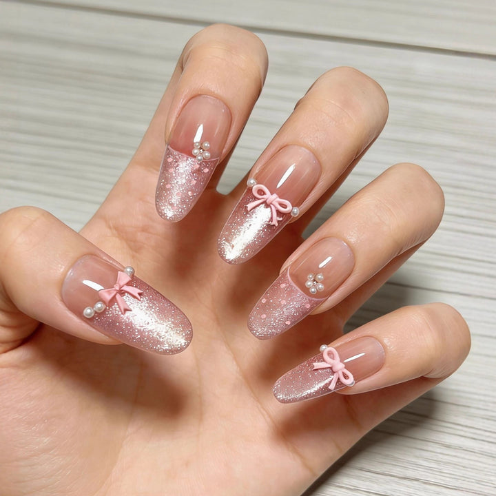 Elegant Artificial Nails with Delicate Gradients and Ribbons Stornfield