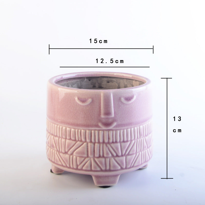 Decorative plant pot with facial features Stornfield