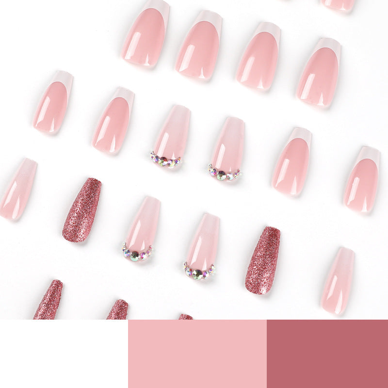 Glamorous artificial nails with rhinestone accents Stornfield