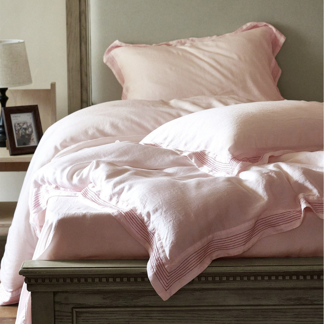 Luxury cotton bedding set with fine piping and elegant linen look