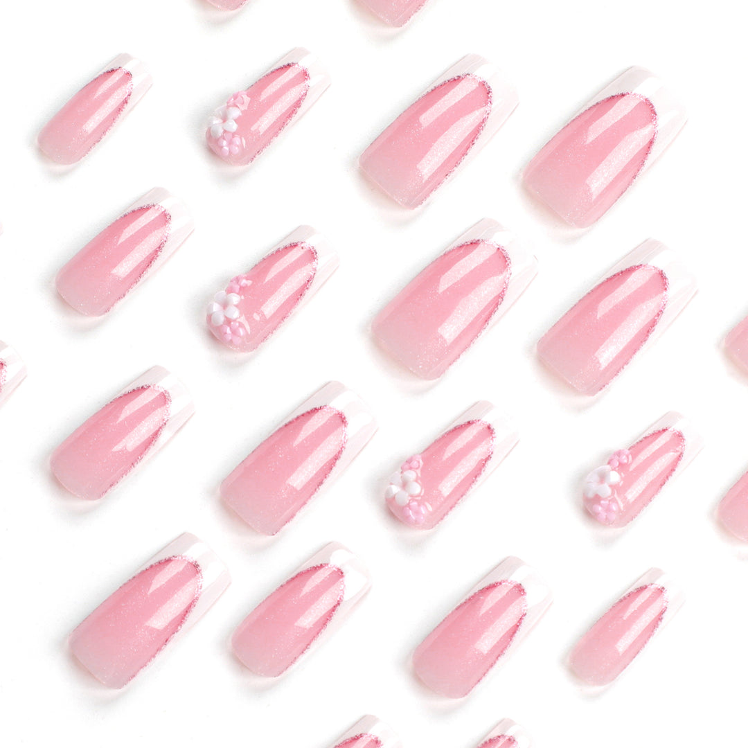 Artful Nail Extensions with Glitter and Flower Accents Stornfield