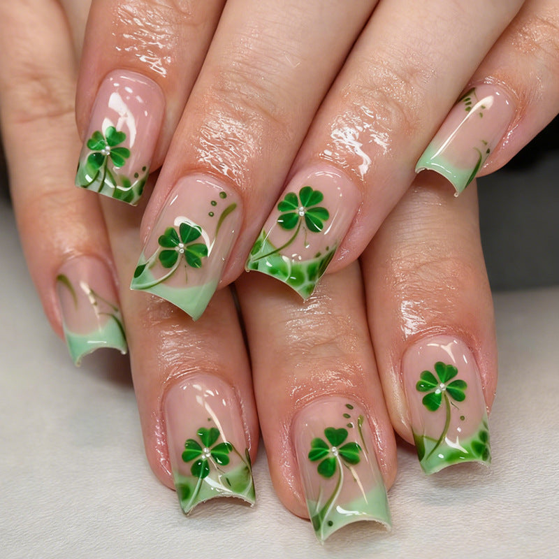 Artificial nail set with festive glitter and clover motifs Stornfield