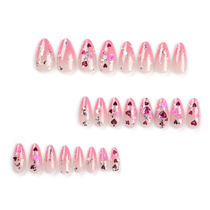 Artful nail art with playful heart designs and glitter Stornfield