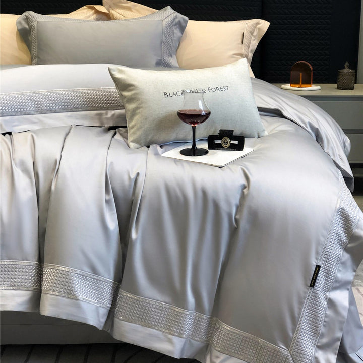 Luxury Satin-Feel Embroidered Duvet Cover Set with Decorative Hem & Pillow Shams