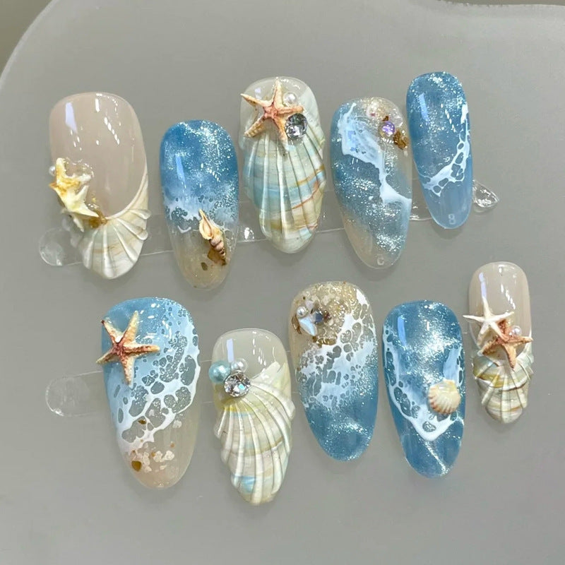Artificial nails with maritime shell pattern Stornfield