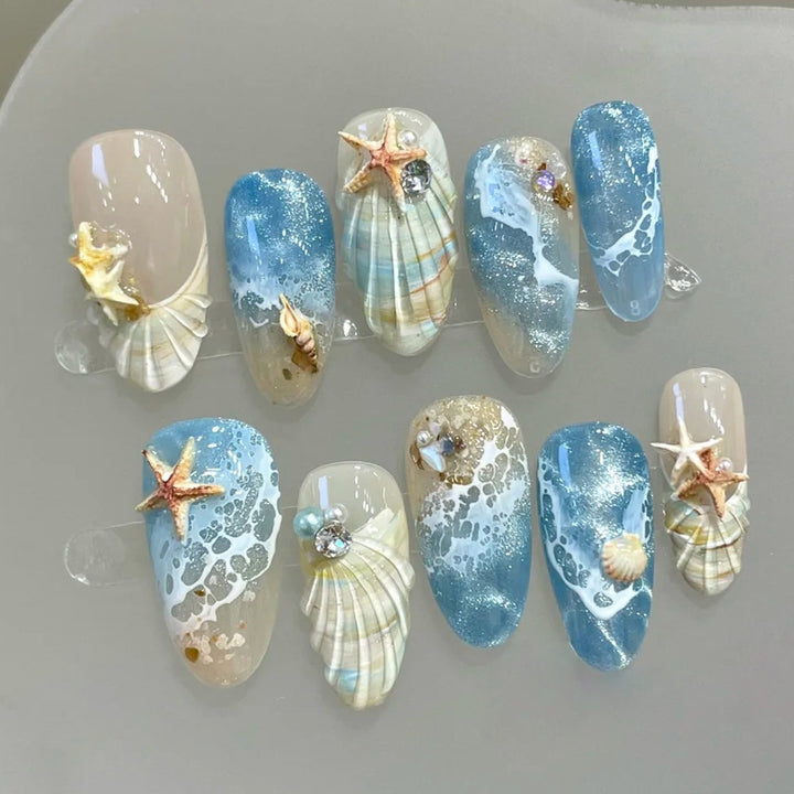 Artificial nails with maritime shell pattern Stornfield