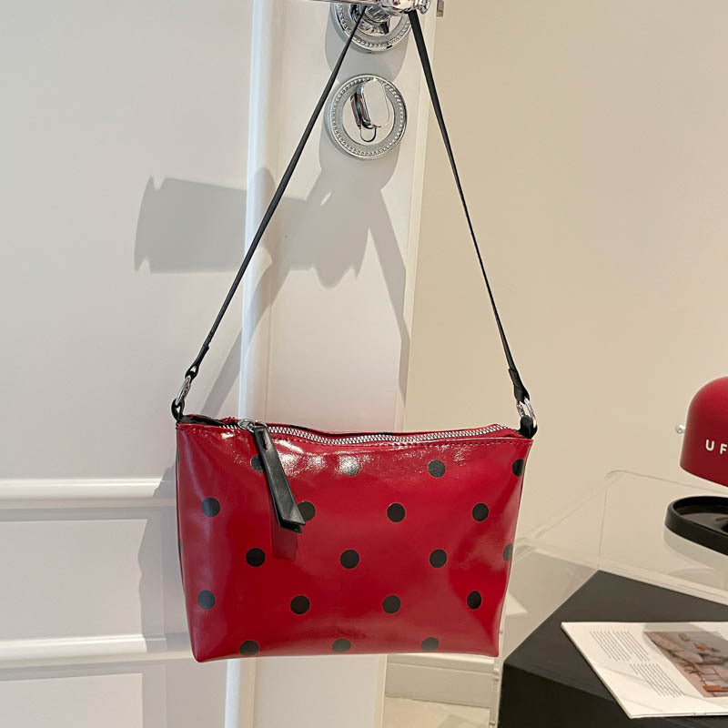Sleek Polka Dot Handheld Clutch