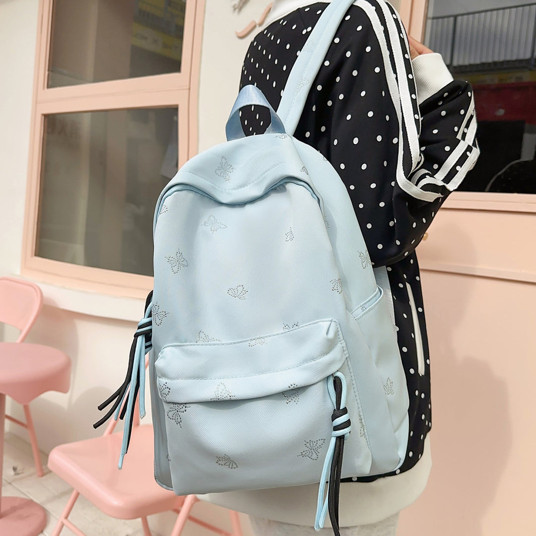 Fashionable backpack with shimmering butterfly design Stornfield