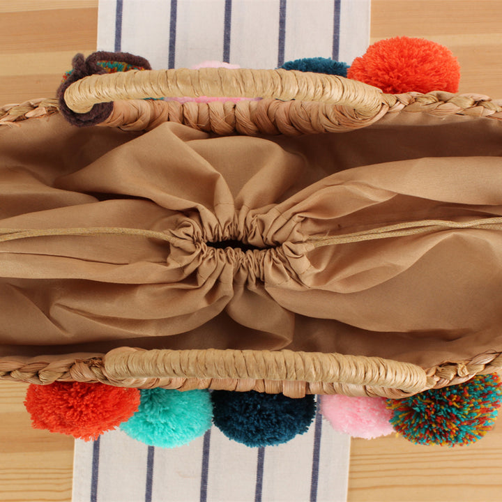Beach bag with colorful pom poms Stornfield