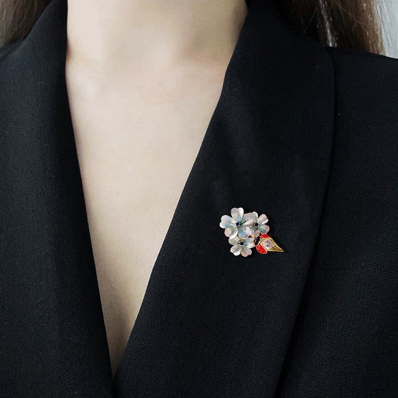 Flower brooch with ladybug and crystal Stornfield