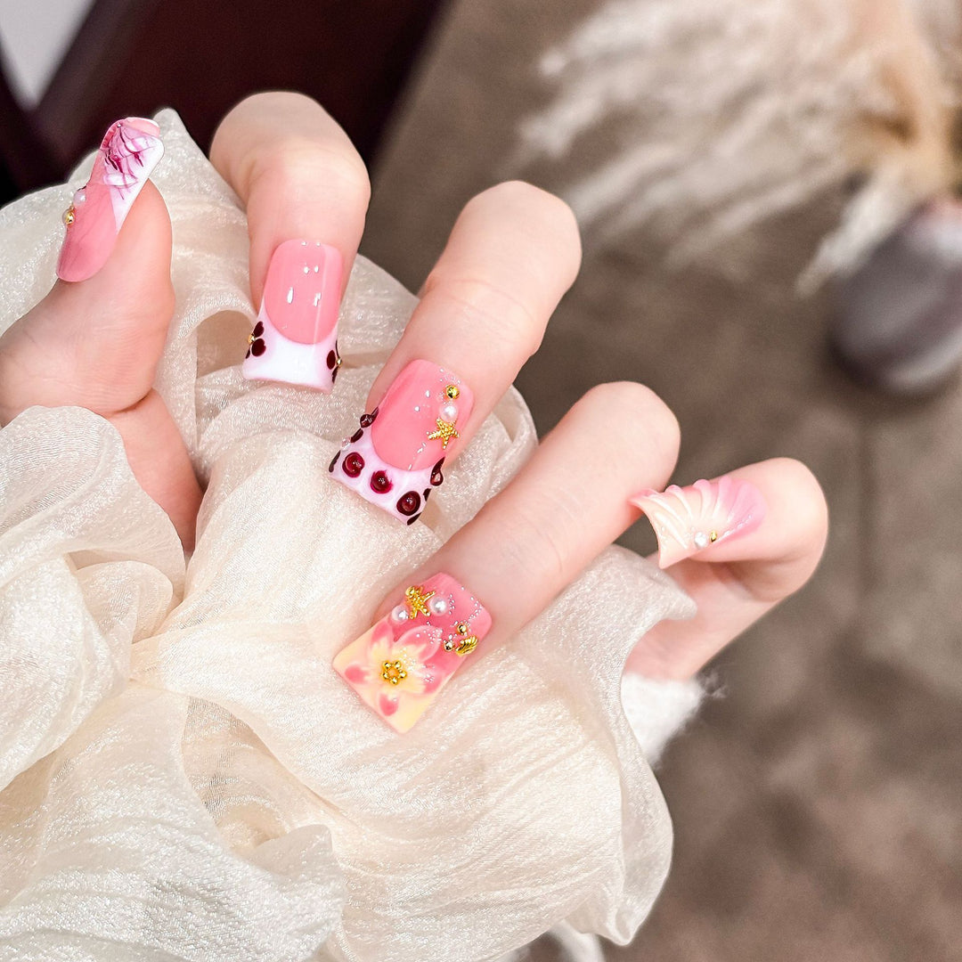 Artistic Acrylic Nail Design with Gem Accents