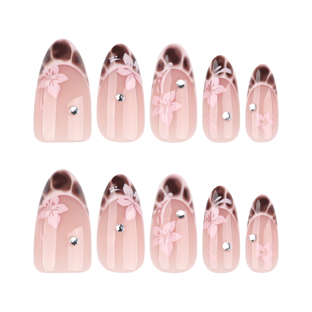 Elegant Artificial Nail Art with Floral Design and Glitter Accents Stornfield