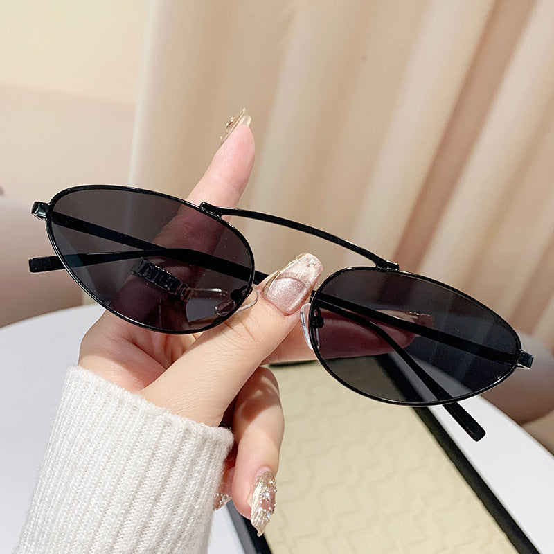 Ladies fashionable sunglasses in elegant oval design Stornfield
