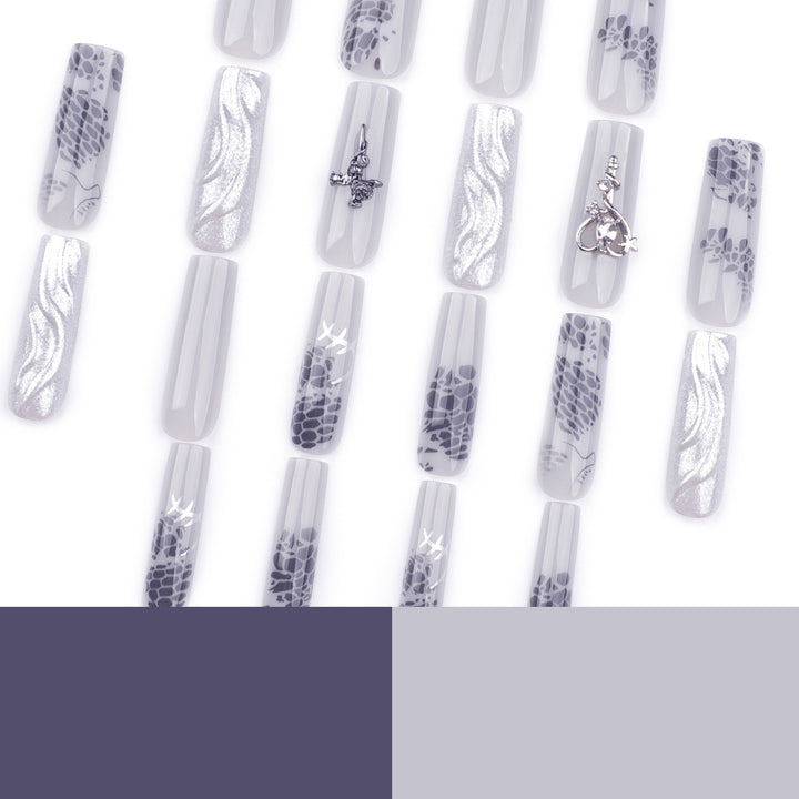 Artful Nail Extensions with Noble Accents Stornfield