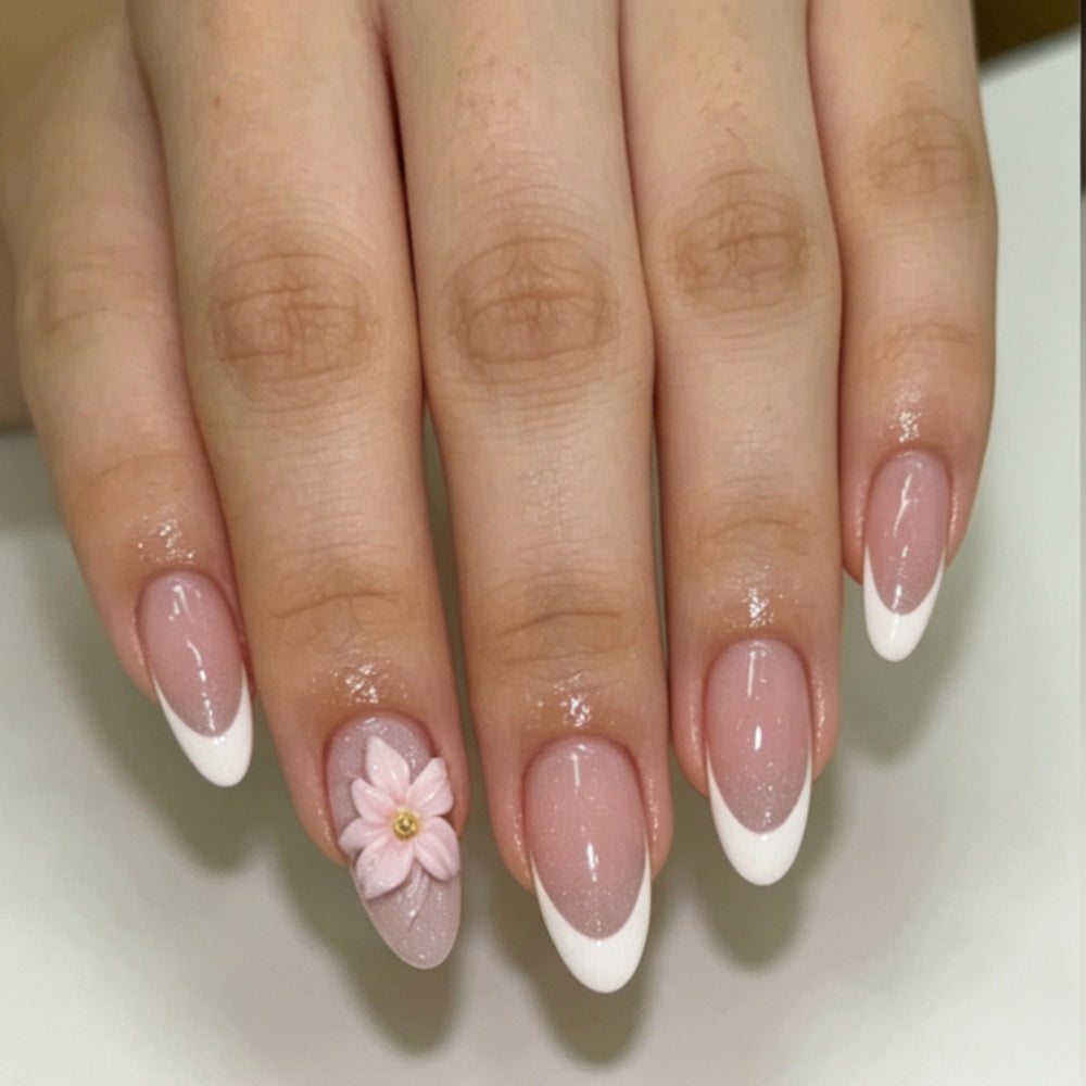 Artificial nails with floral decoration and elegant French tip design Stornfield