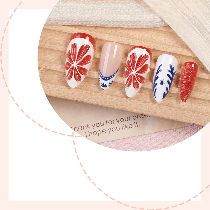 Artificial nail set with floral and elegant designs Stornfield