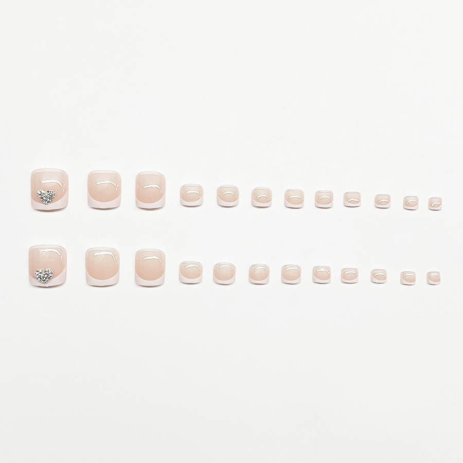 Artifical nail set with glamorous heart design and elegant French tip Stornfield