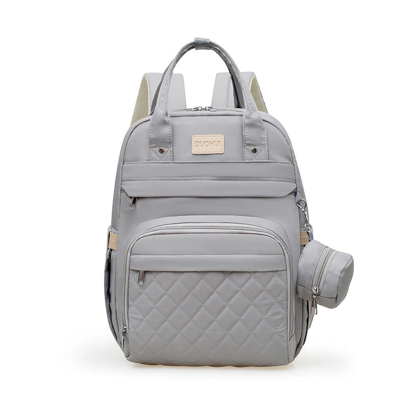 Versatile Quilted Backpack with Handy Side Pouch Stornfield