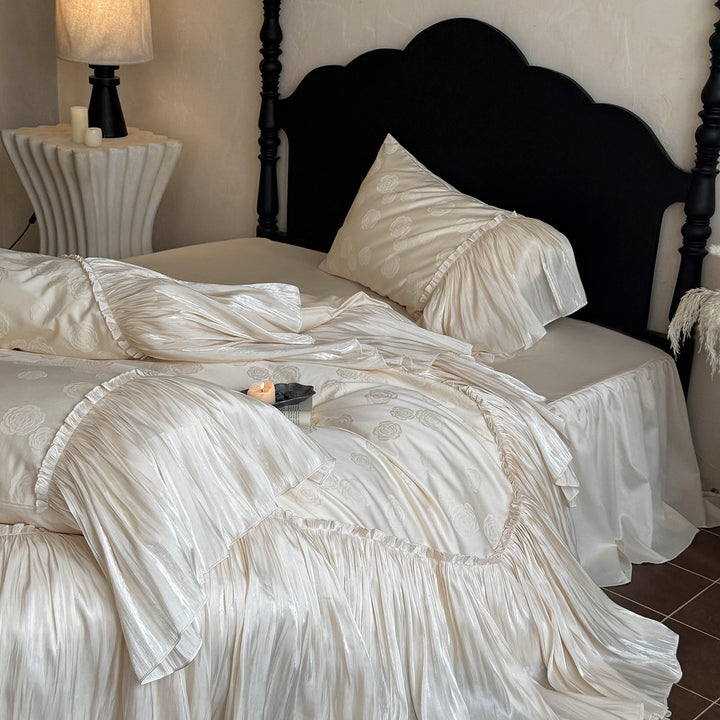 Luxurious satin bed linen set with ruffles and rose relief
