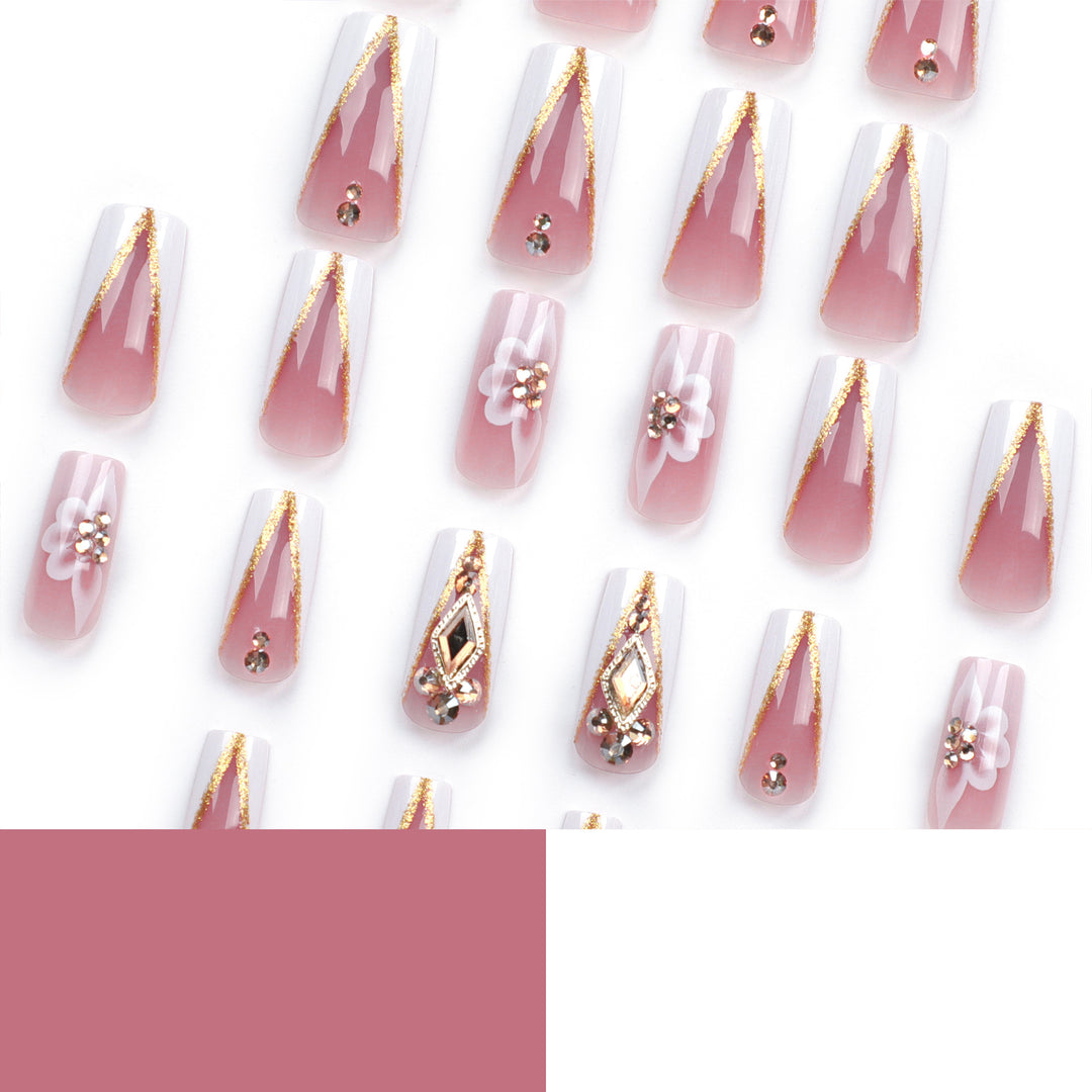 Artistic nail extensions with floral and glitter accents Stornfield