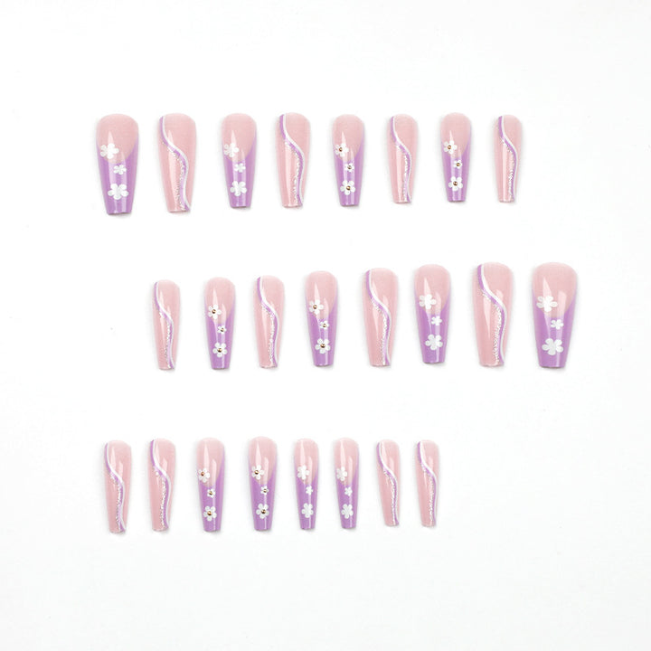 Creative nail art with floral accents Stornfield