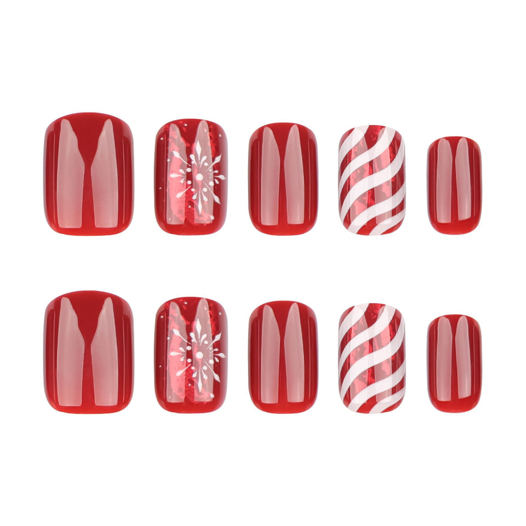 Artificial nail set with festive designs and glitter accents Stornfield