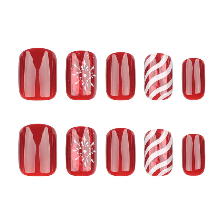 Artificial nail set with festive designs and glitter accents Stornfield