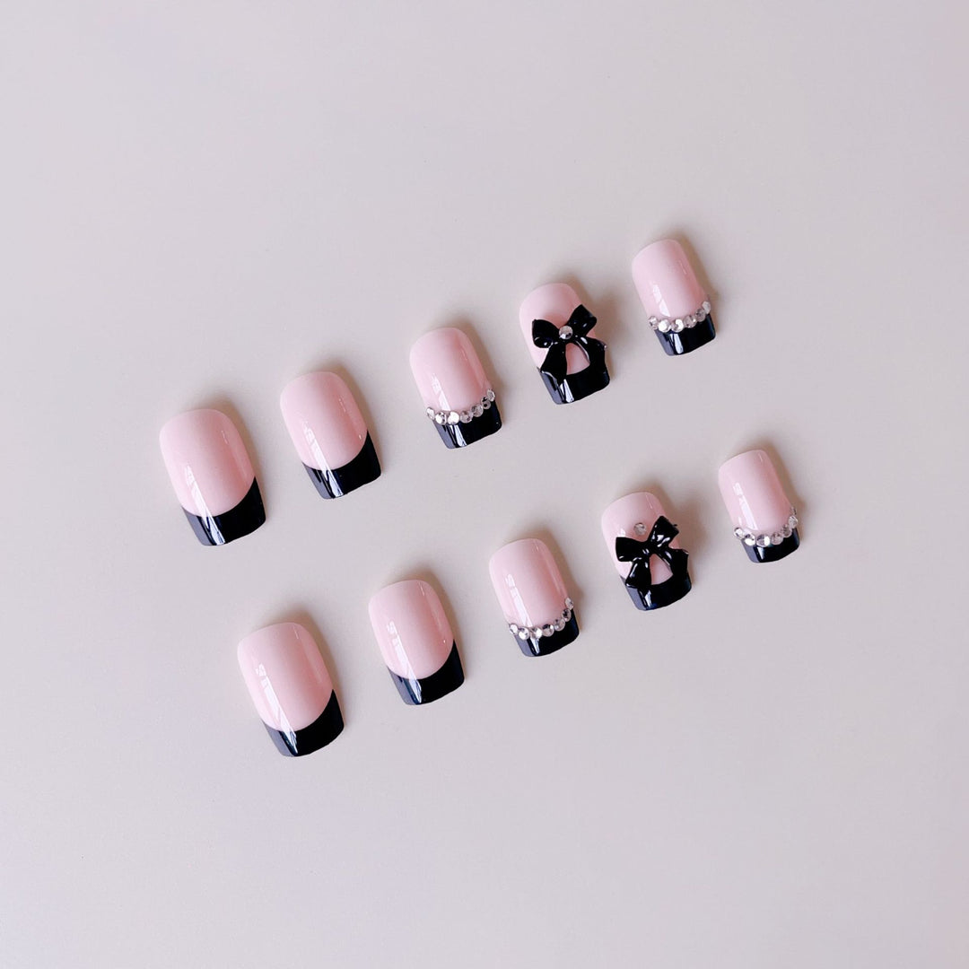 Artificial Nail Set with Elegant Bows and Glitter Decorations Stornfield