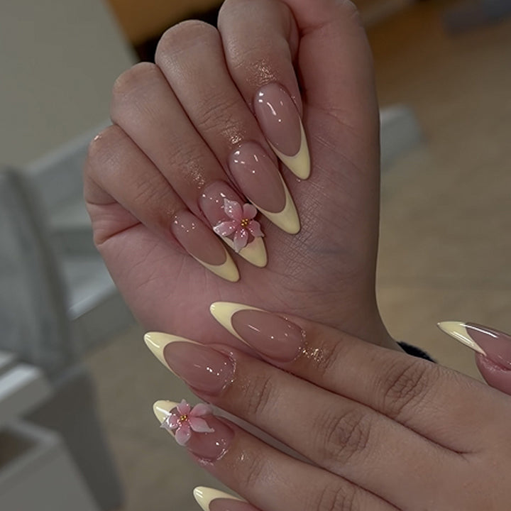 Artful stiletto nails with elegant flower accent Stornfield