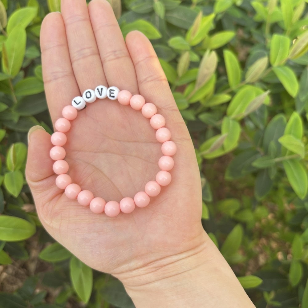 Friendship bracelet made of pastel beads Stornfield