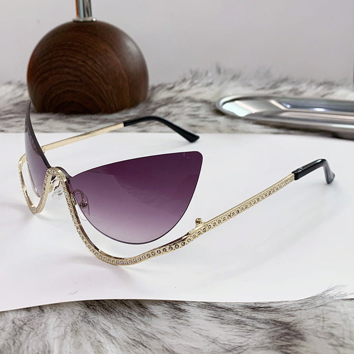 Women's extravagantly shaped Cat-Eye sunglasses with sparkling appliqués Stornfield