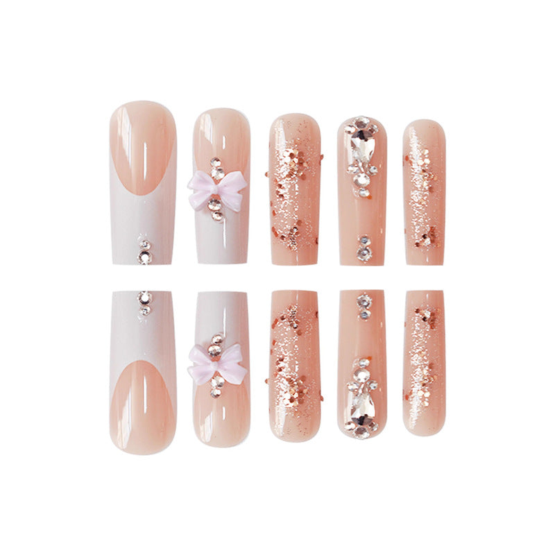 Artistic 3D Bow and Gemstone Press-On Nails Stornfield