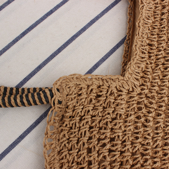 Handmade straw shoulder bag with structured design Stornfield