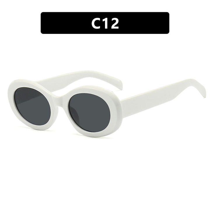 Women's fashionable sunglasses in original oval design with transparent frame and UV protection Stornfield