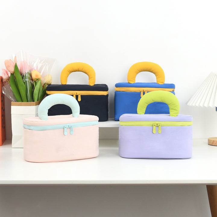 Cosmetic organizer with ergonomic carrying handle Stornfield