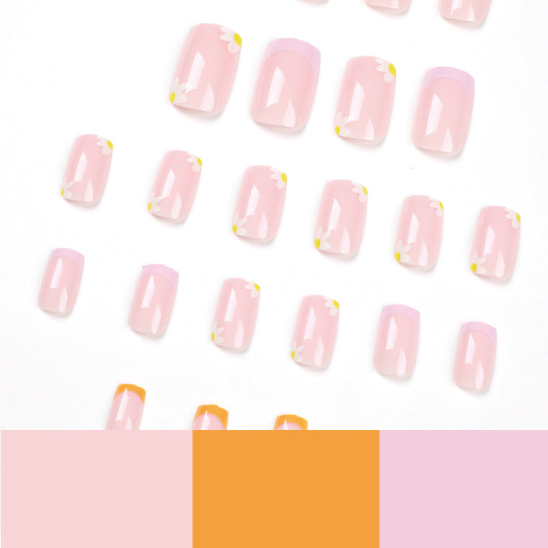 Artistic acrylic nails with floral design and creative color accents Stornfield