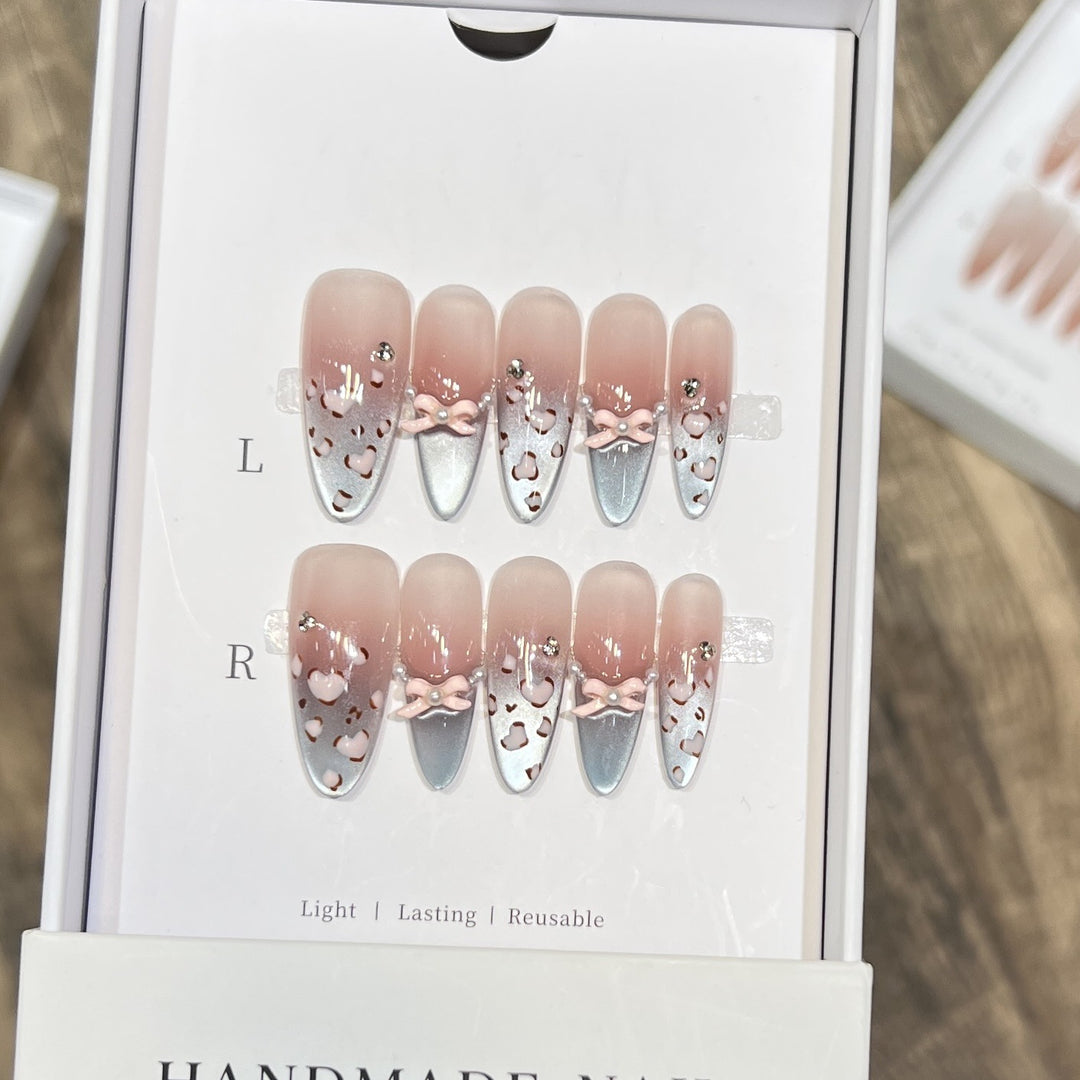 Decorative Press-On Nail Design with Bow Accents Stornfield