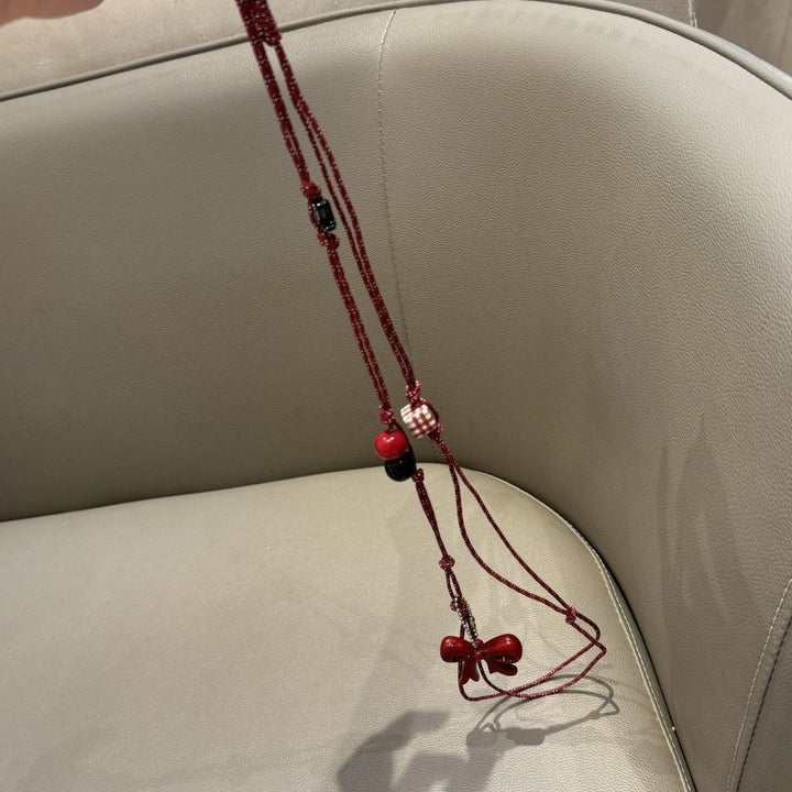 Playful Bead Charm Eyewear Holder Stornfield