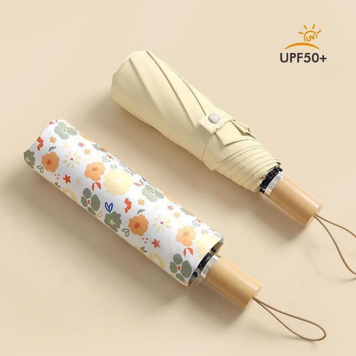 Ladies elegant and colorful folding umbrella with floral design Stornfield