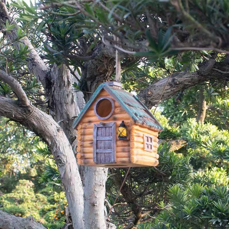 Decorative birdhouse in rustic construction style Stornfield