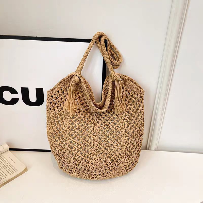 Handcrafted straw bag with tassels Stornfield