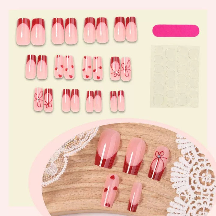 Artificial nail set with romantic heart and bow motifs Stornfield