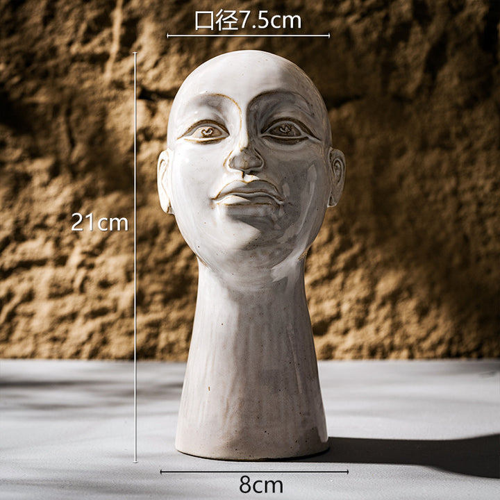 Hand-glazed contemporary sculptural head plant vase with narrow neck