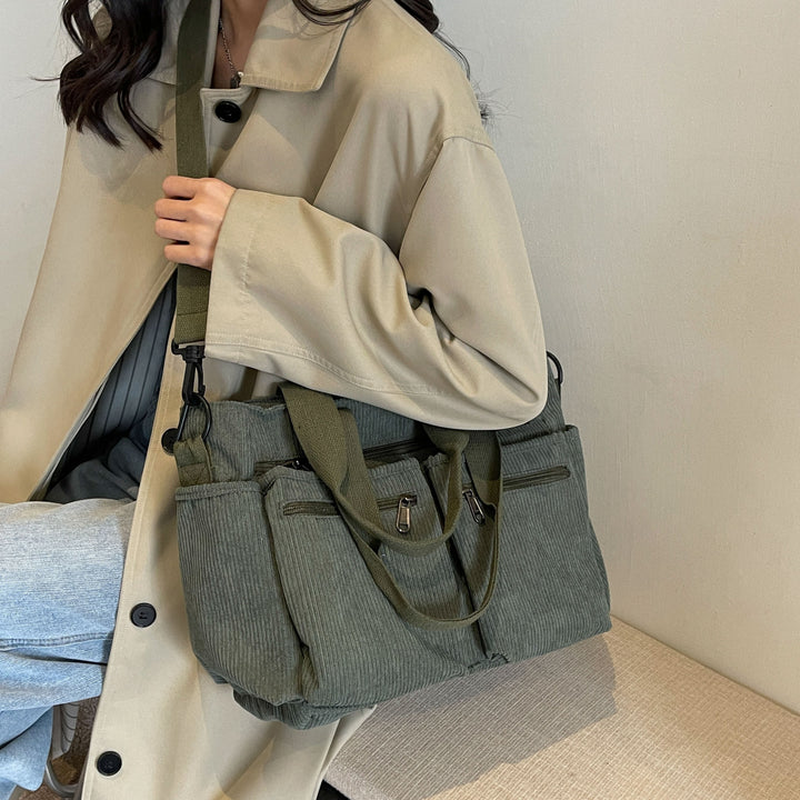Durable shoulder bag with multiple compartments Stornfield