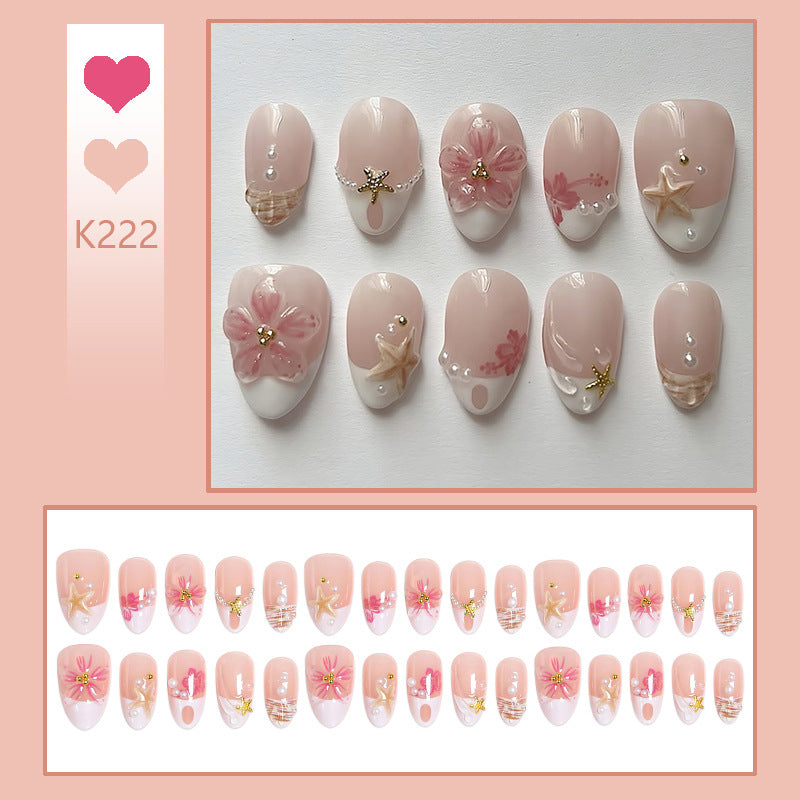 Artificial nail set with floral and maritime designs Stornfield
