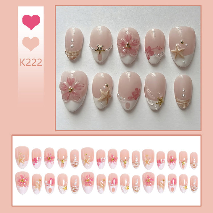 Artificial nail set with floral and maritime designs Stornfield
