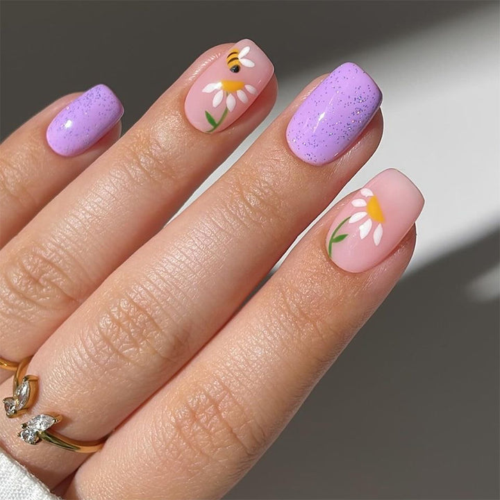 Artfully designed nail extensions with flower design Stornfield