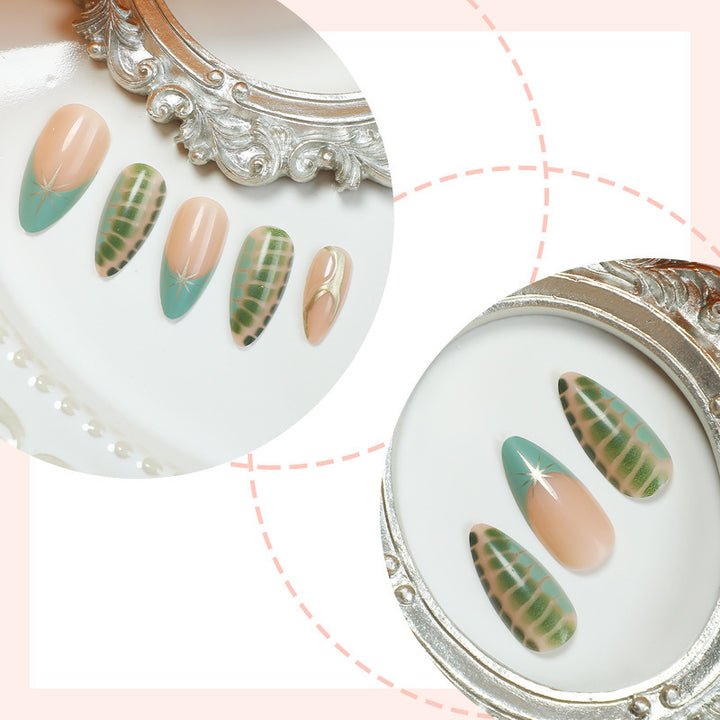 Artificial nail set with creative leaf design and elegant glitter accents Stornfield