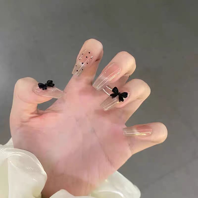 Trendy Press-On Nail Art Set with Stylish Bow Accents Stornfield
